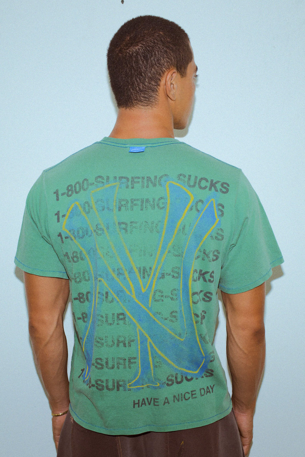 1-800 Surfing Sucks Box Tee In Summer Green