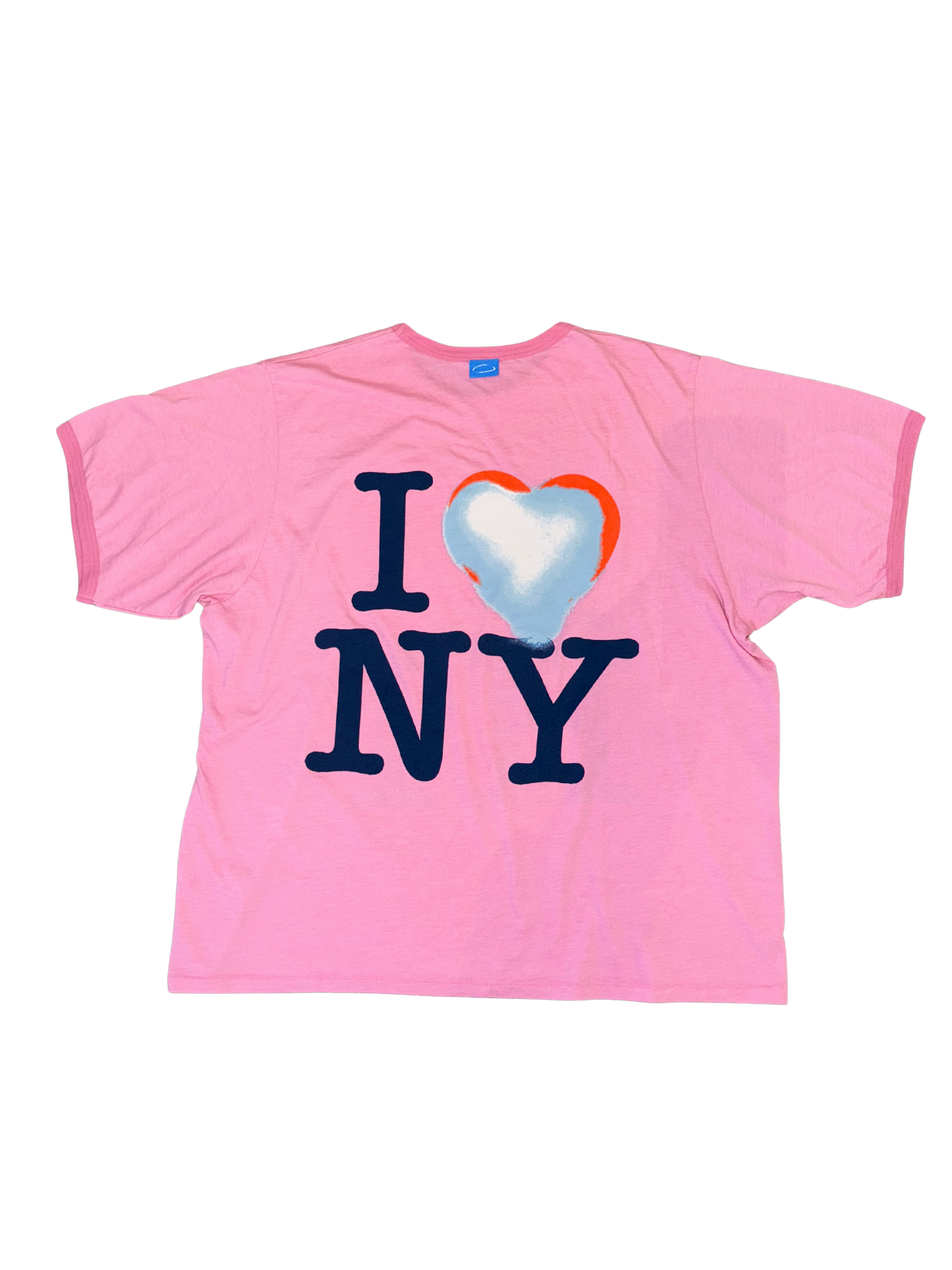 Pink t-shirt with blue heart and text design on a white background